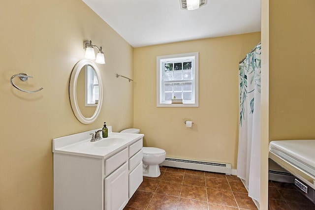 40 Guptill Rd, Belgrade, ME 04917 - bathroom featuring baseboard heating, vanity, and tile patterned floors