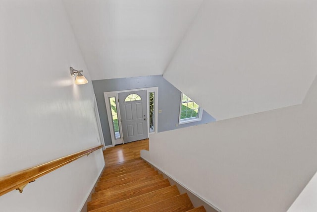 40 Guptill Rd, Belgrade, ME 04917 - staircase with lofted ceiling and wood finished floors