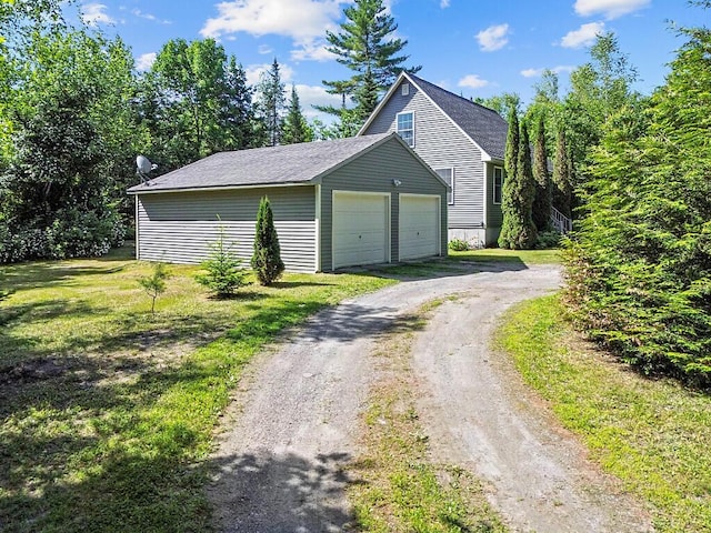 40 Guptill Rd, Belgrade, ME 04917 - garage featuring driveway