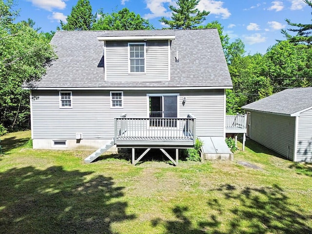40 Guptill Rd, Belgrade, ME 04917 - rear view of house with a wooden deck, a yard, and a shingled roof