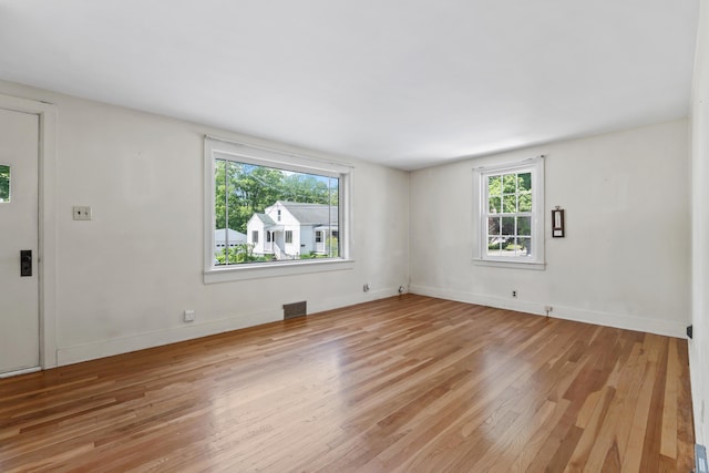12 Neally St, South Berwick, ME 03908 - unfurnished room with wood finished floors and baseboards