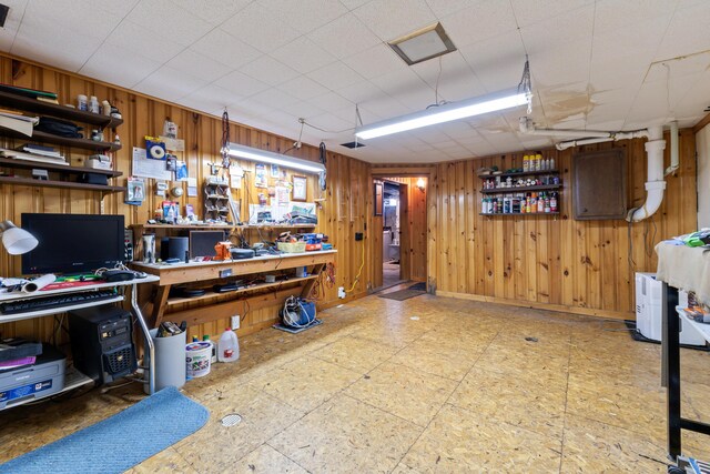 12 Neally St, South Berwick, ME 03908 - miscellaneous room with wood walls, a workshop area, and baseboards