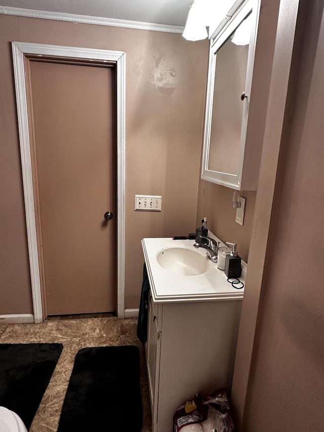 33 Washington St, Caribou, ME 04736 - bathroom featuring vanity and baseboards