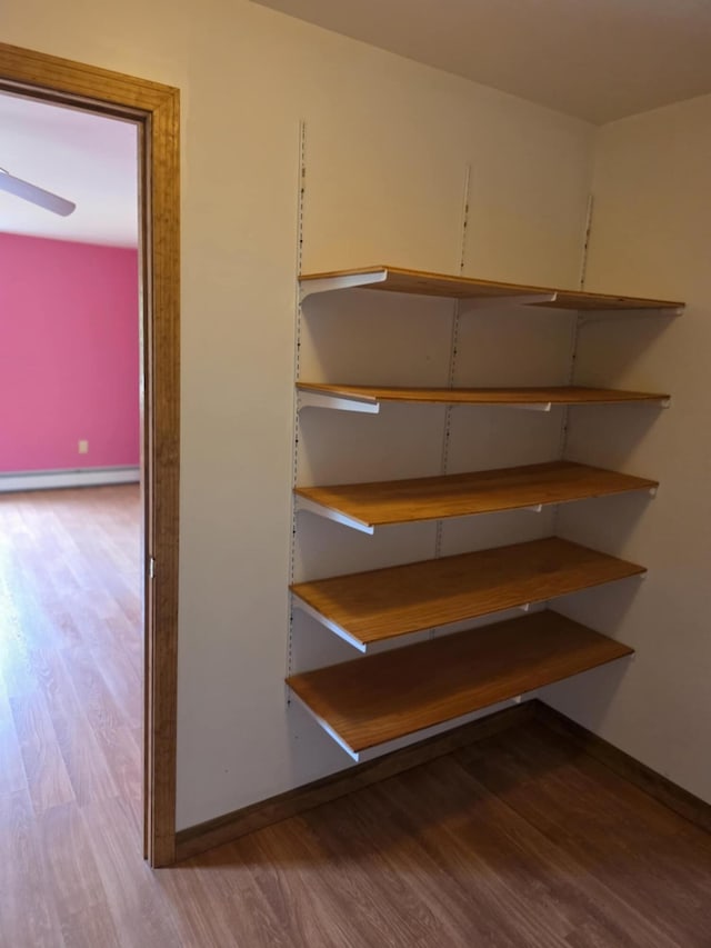 61 Gagnon Rd, Oakland, ME 04963 - storage area with a baseboard radiator