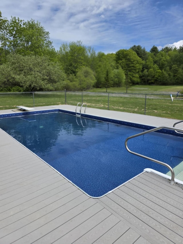 61 Gagnon Rd, Oakland, ME 04963 - outdoor pool featuring a diving board