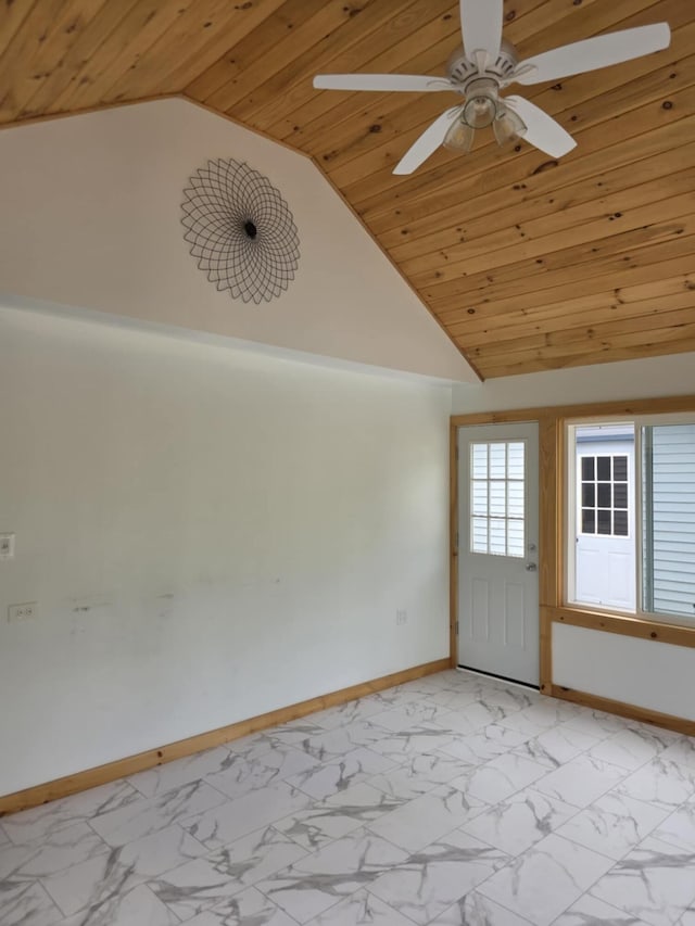 61 Gagnon Rd, Oakland, ME 04963 - spare room featuring baseboards, light marble finish flooring, wood ceiling, ceiling fan, and high vaulted ceiling