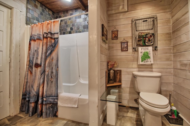 14 Jude Ln, Ellsworth, ME 04605 - full bathroom featuring wooden walls, toilet, and shower / tub combo