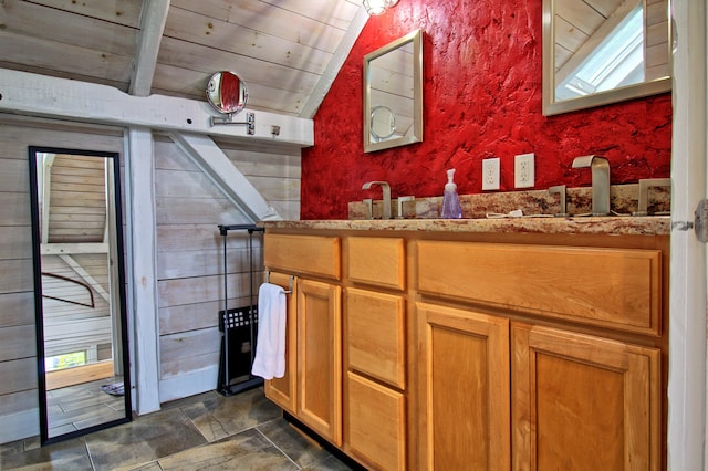14 Jude Ln, Ellsworth, ME 04605 - bathroom featuring vaulted ceiling, double vanity, and wooden ceiling