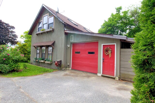 14 Jude Ln, Ellsworth, ME 04605 - garage with asphalt driveway