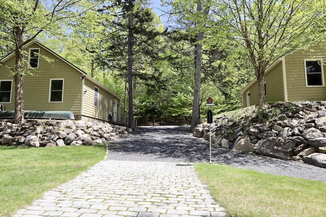 500 Black Point Rd, Beaver Cove, ME 04441 - view of side of property with decorative driveway