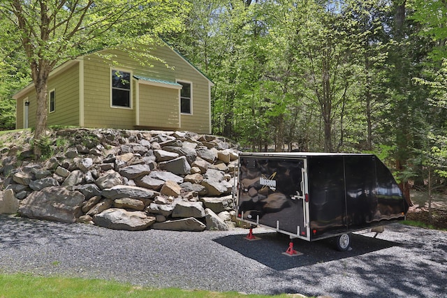 500 Black Point Rd, Beaver Cove, ME 04441 - view of outdoor structure featuring a forest view