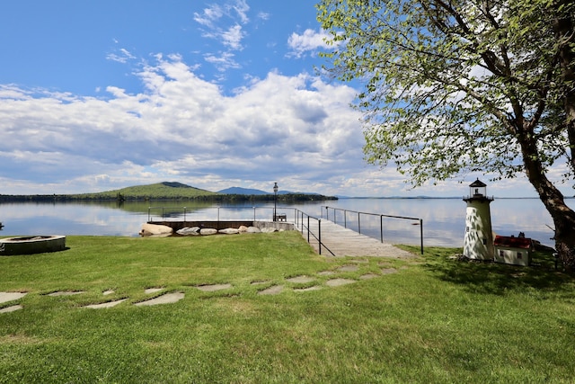 500 Black Point Rd, Beaver Cove, ME 04441 - dock with a yard and a water view