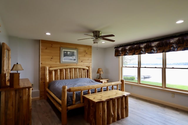500 Black Point Rd, Beaver Cove, ME 04441 - bedroom with recessed lighting, baseboards, light wood-style flooring, and a ceiling fan
