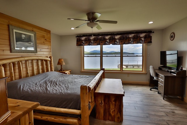 500 Black Point Rd, Beaver Cove, ME 04441 - bedroom with wood finished floors, recessed lighting, baseboards, and a ceiling fan