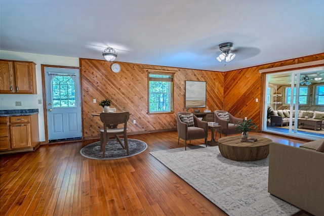 3 Reeds Ln, Belfast, ME 04915 - living area featuring a ceiling fan, wood-type flooring, and wooden walls