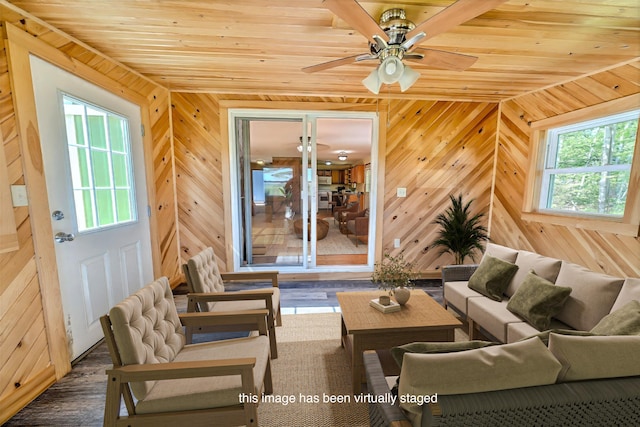 3 Reeds Ln, Belfast, ME 04915 - living area featuring wood ceiling, wood walls, wood finished floors, and a ceiling fan