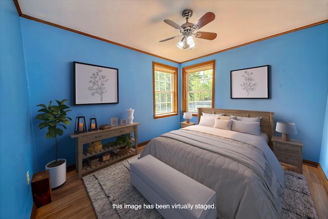 3 Reeds Ln, Belfast, ME 04915 - bedroom with ornamental molding, baseboards, wood finished floors, and ceiling fan