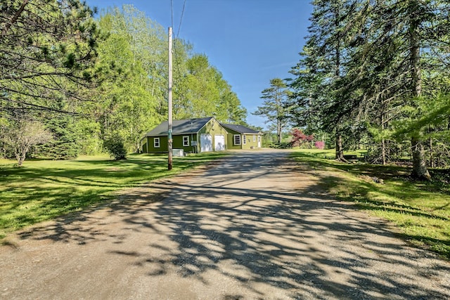 3 Reeds Ln, Belfast, ME 04915 - ranch-style house featuring asphalt driveway and a front lawn