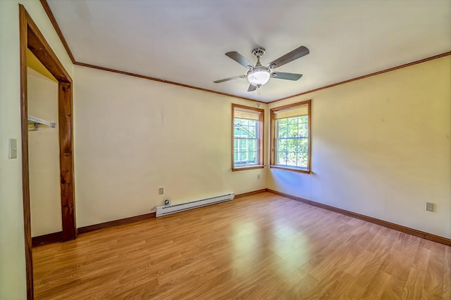 3 Reeds Ln, Belfast, ME 04915 - spare room featuring baseboard heating, a ceiling fan, light wood-style flooring, baseboards, and crown molding