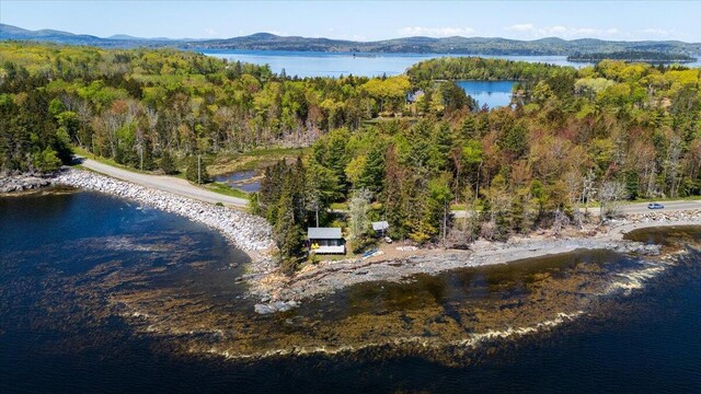459 Main Rd, Islesboro, ME 04848 - aerial view of property and surrounding area with a heavily wooded area and a water and mountain view
