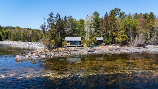 459 Main Rd, Islesboro, ME 04848 - water view with a heavily wooded area