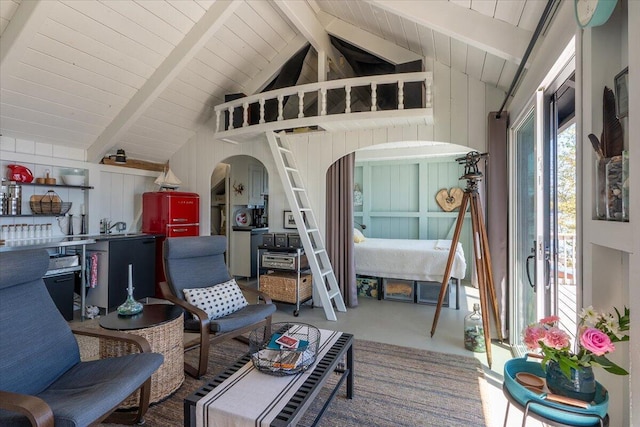 459 Main Rd, Islesboro, ME 04848 - living area featuring wooden ceiling, wood walls, and arched walkways