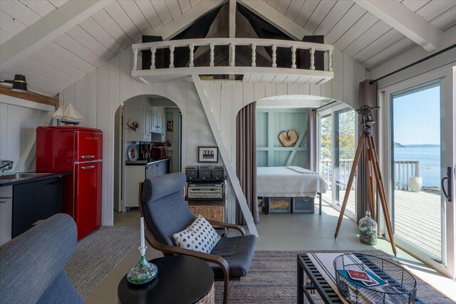 459 Main Rd, Islesboro, ME 04848 - bedroom featuring arched walkways, access to exterior, and a water view