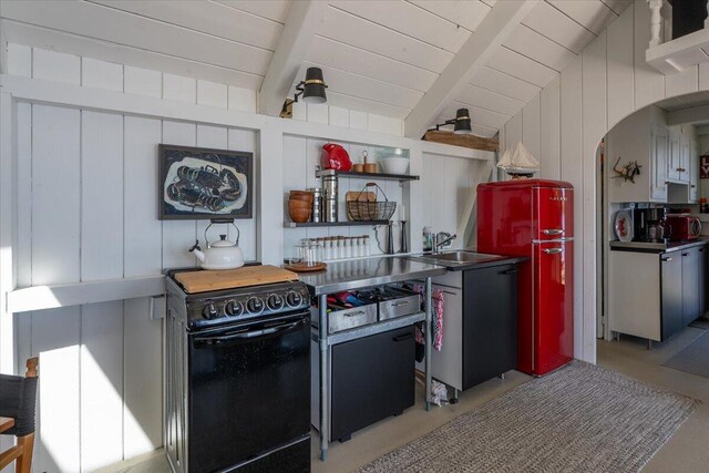 459 Main Rd, Islesboro, ME 04848 - kitchen featuring electric range, arched walkways, open shelves, and wooden ceiling