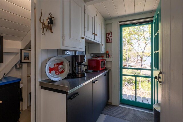 459 Main Rd, Islesboro, ME 04848 - kitchen featuring wood ceiling and white cabinetry