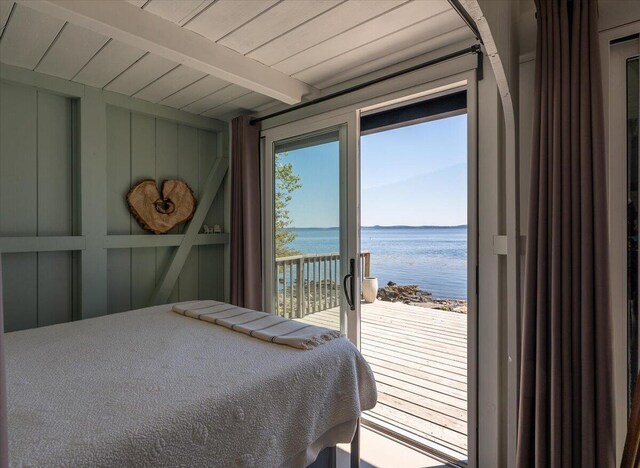 459 Main Rd, Islesboro, ME 04848 - bedroom with a water view, access to exterior, and beam ceiling