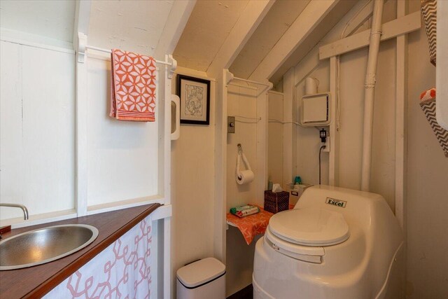 459 Main Rd, Islesboro, ME 04848 - bathroom featuring lofted ceiling and vanity
