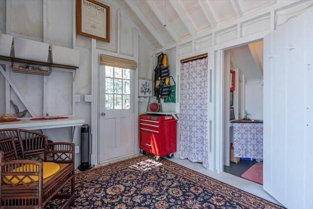 459 Main Rd, Islesboro, ME 04848 - doorway to outside with lofted ceiling