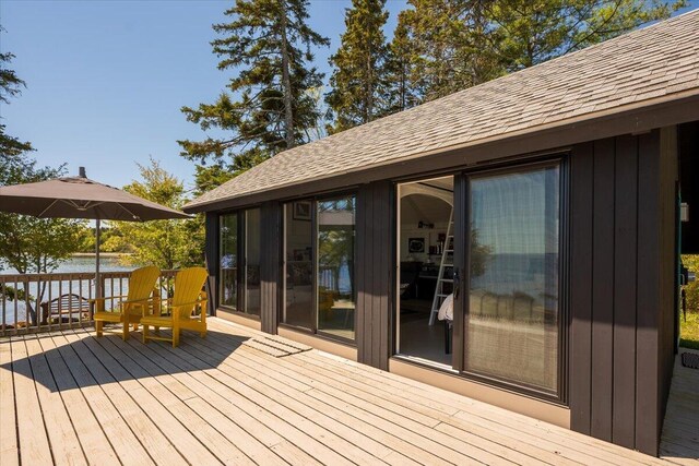 459 Main Rd, Islesboro, ME 04848 - wooden terrace featuring a water view