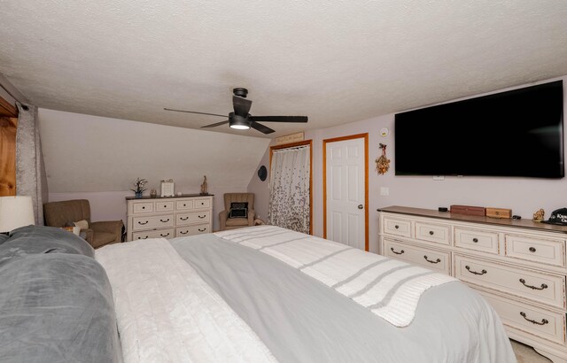 68 Lone Pine Rd, Waterboro, ME 04061 - bedroom with ceiling fan, a textured ceiling, and lofted ceiling