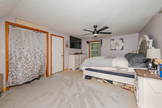 68 Lone Pine Rd, Waterboro, ME 04061 - bedroom featuring light carpet, ceiling fan, and a textured ceiling