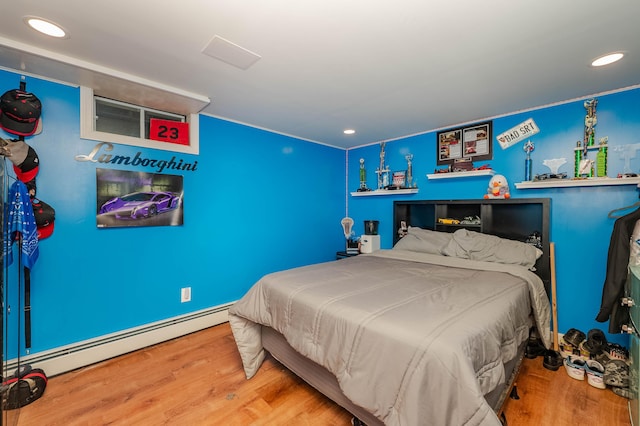 68 Lone Pine Rd, Waterboro, ME 04061 - bedroom with wood finished floors, baseboard heating, and recessed lighting