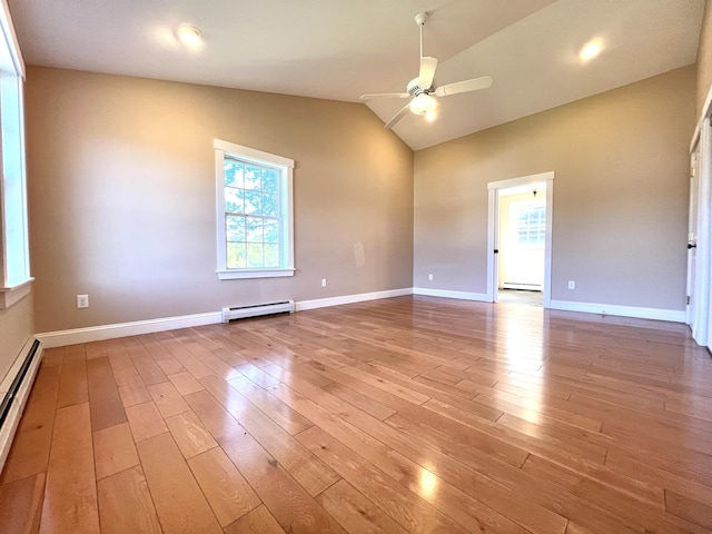 52 Peary Ter, South Portland, ME 04106 - spare room with a baseboard radiator, light wood-style floors, ceiling fan, vaulted ceiling, and baseboard heating