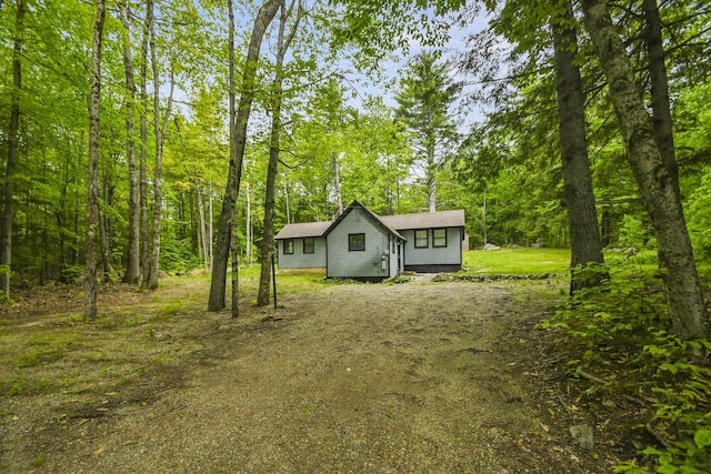 398 Hopper Rd, Acton, ME 04001 - view of front of home featuring dirt driveway and a view of trees