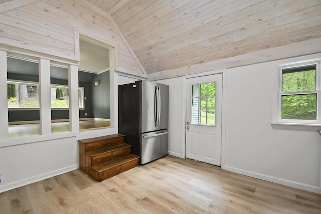 398 Hopper Rd, Acton, ME 04001 - foyer featuring lofted ceiling, wooden ceiling, light wood-style floors, baseboards, and stairs