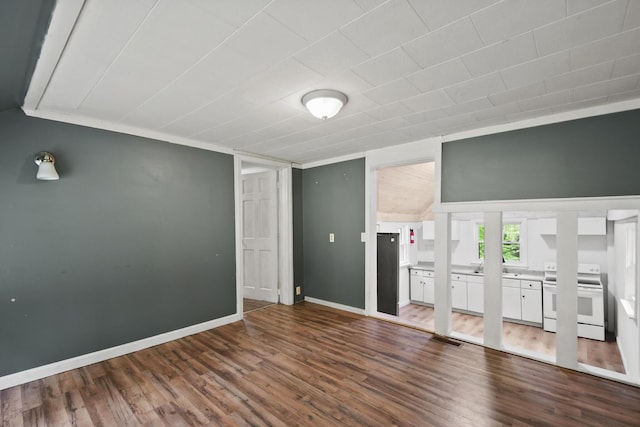 398 Hopper Rd, Acton, ME 04001 - unfurnished living room featuring wood finished floors and baseboards