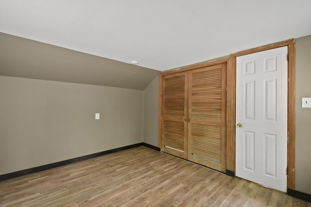 398 Hopper Rd, Acton, ME 04001 - additional living space featuring light wood-style floors, baseboards, and vaulted ceiling