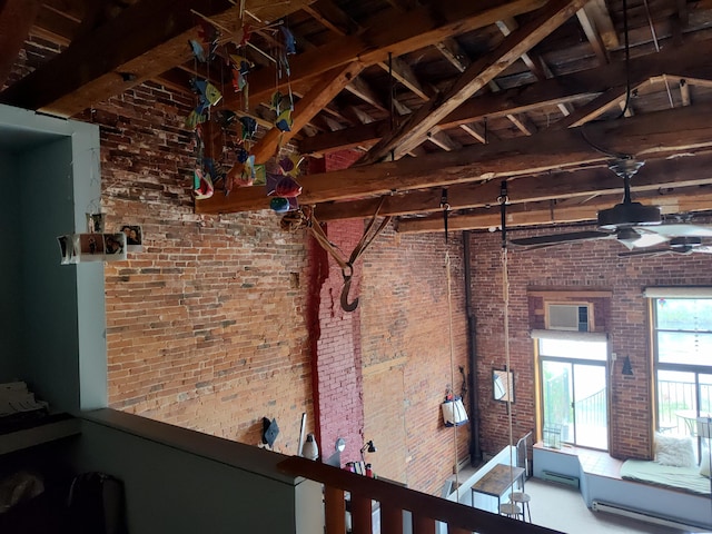 92-94 Main St, Auburn, ME 04210 - misc room with brick wall, a ceiling fan, and a high ceiling
