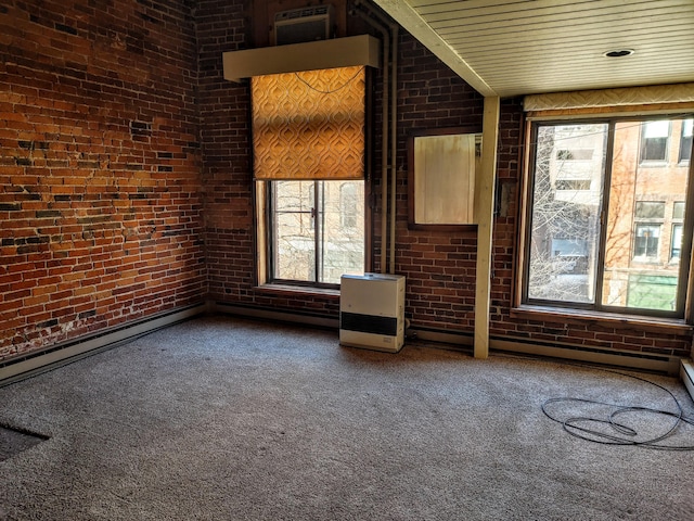 92-94 Main St, Auburn, ME 04210 - unfurnished living room with brick wall, healthy amount of natural light, carpet floors, and heating unit