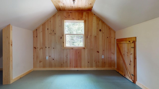 121 Loop Rd, Lincoln, ME 04457 - bonus room featuring lofted ceiling, wood walls, and baseboards