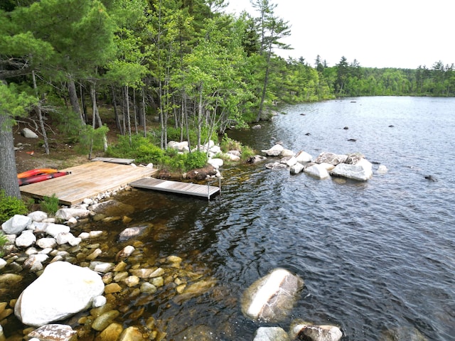 121 Loop Rd, Lincoln, ME 04457 - water view featuring a forest and a floating dock