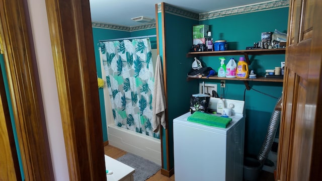 422 Cross Rd, Swanville, ME 04915 - laundry area featuring washer / dryer and wood finished floors