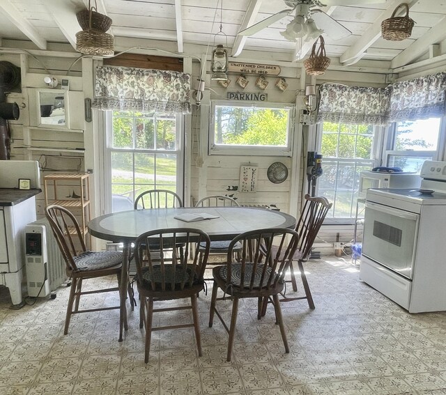 51 Rock Haven Dr, West Bath, ME 04530 - dining space featuring plenty of natural light, ceiling fan, beamed ceiling, and light flooring
