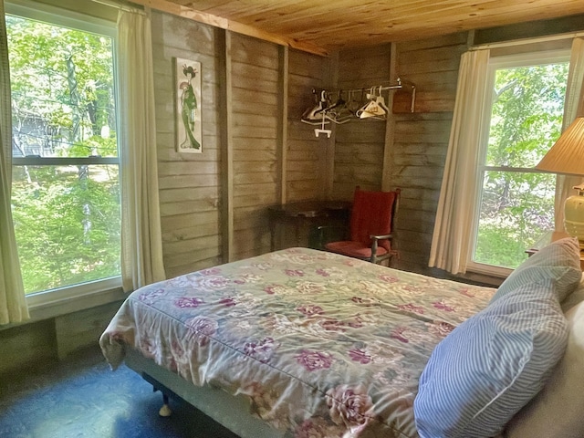 51 Rock Haven Dr, West Bath, ME 04530 - bedroom featuring wooden ceiling, wood walls, and multiple windows