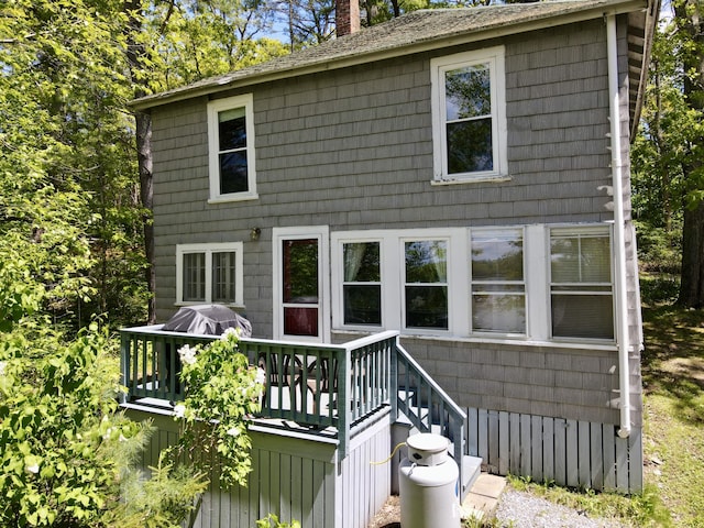 51 Rock Haven Dr, West Bath, ME 04530 - rear view of house with a chimney and a deck