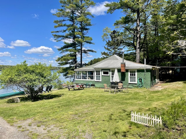 51 Rock Haven Dr, West Bath, ME 04530 - view of front of house with a front yard and a sunroom